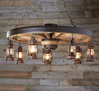 Large Wagon Wheel Chandelier with Lanterns - Ozark Cabin Décor, LLC